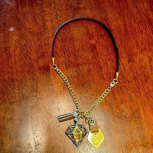 Very nice custom necklace with brown band and heart pendant